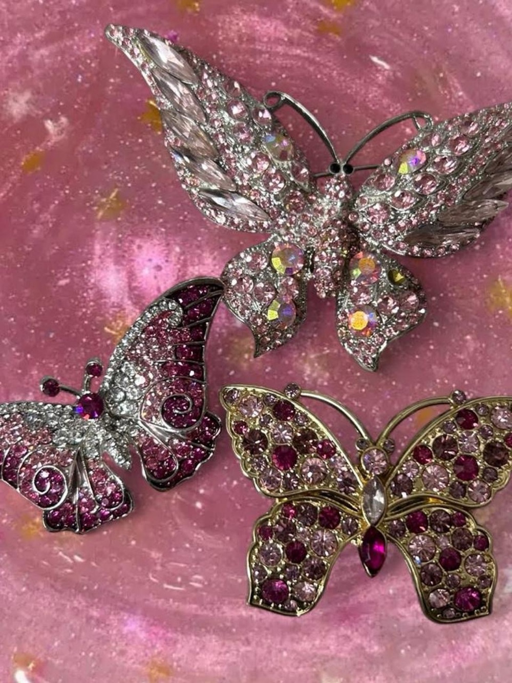 Butterfly brooches with pink and purple rhinestones